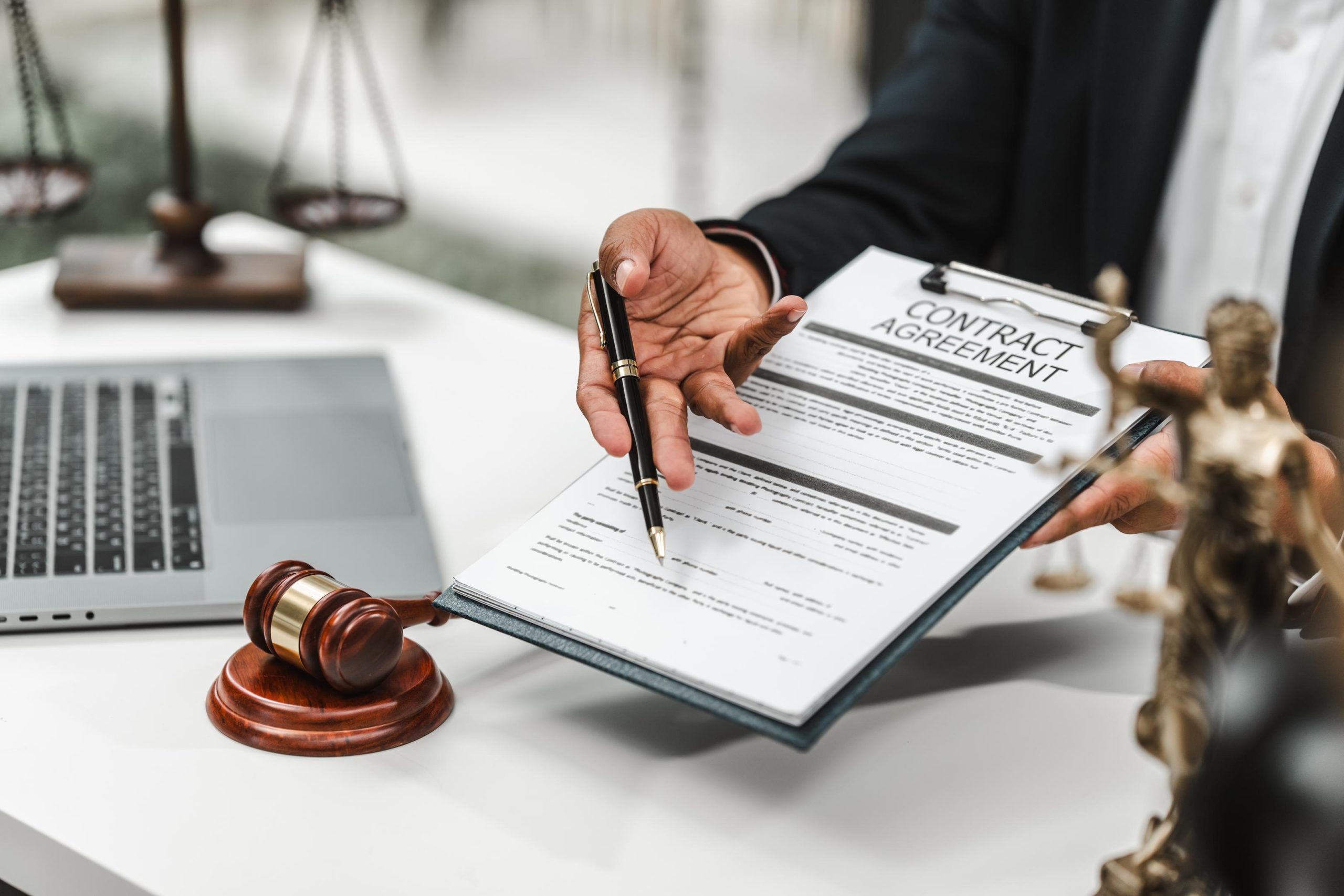 Contract Agreement Lawyer with Laptop and Gavel