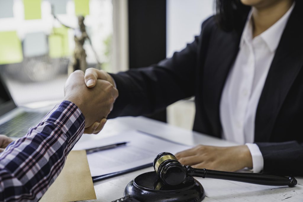 Lawyers give advice about judgment, agreements, Consultation of Businesswoman and Male lawyer or judge counselor having team meeting with client