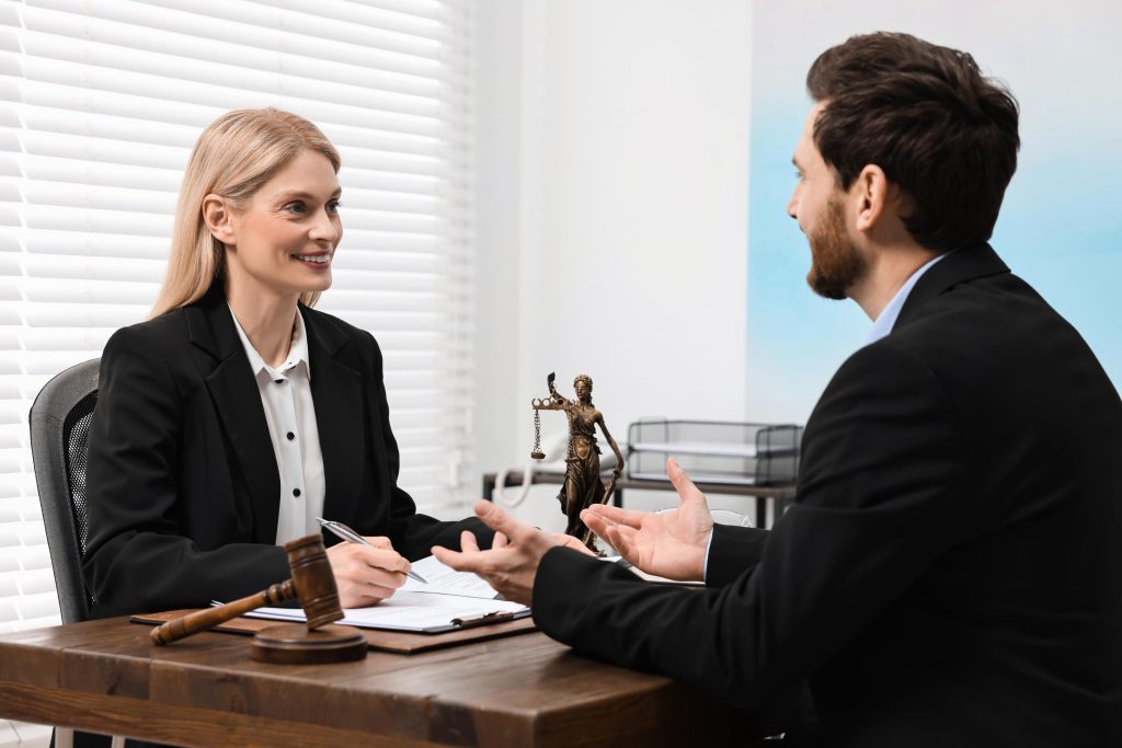Man having meeting with lawyer in office