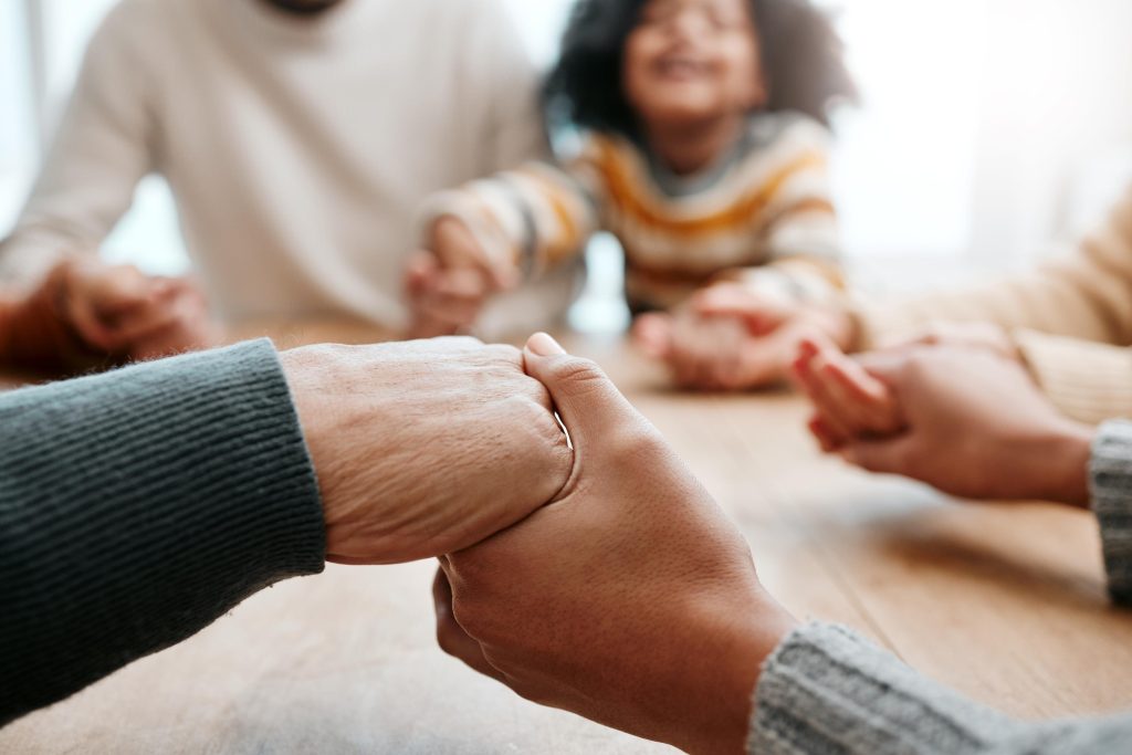 God, holding hands or big family praying for support or hope in Christian home for worship together.